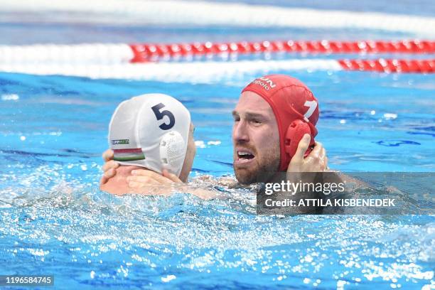 Hungary's goalkeeper Viktor Nagy and Hungary's wing Marton Vamos winning the men's water polo final match between Hungary and Spain at the European...