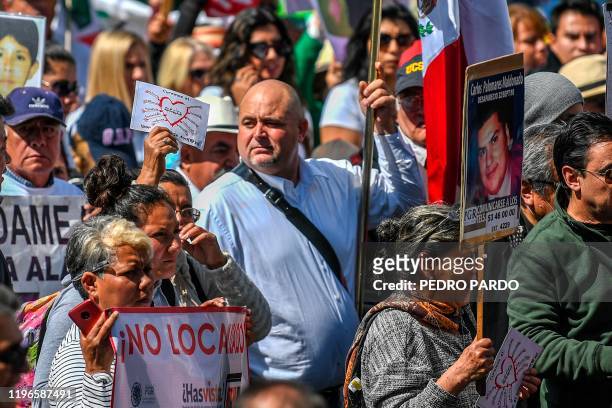 Mormon activist Julian LeBaron, relative of some of the Mormon victims of an ambush the past November- takes part in a march for peace in Mexico...