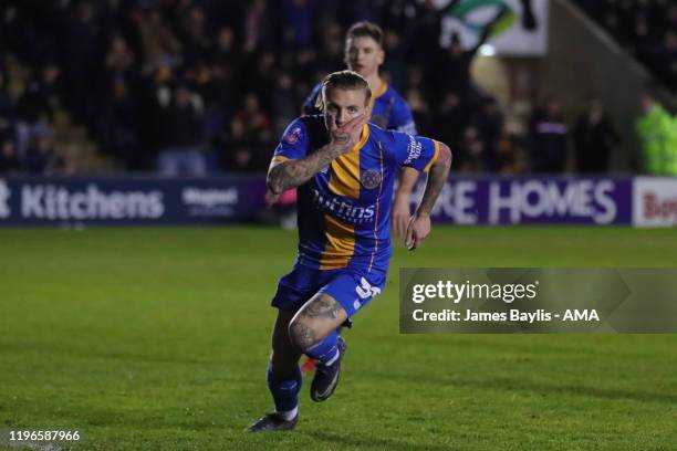 Jason Cummings of Shrewsbury Town celebrates after scoring a goal to make it 1-2 during the FA Cup Fourth Round match between Shrewsbury Town and...