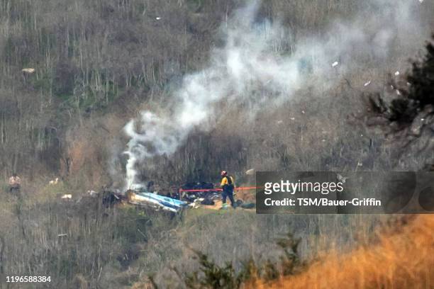 The site of a helicopter crash that claimed the lives of former NBA great Kobe Bryant and his daughter Gianna Bryant is shown January 26, 2020 in...