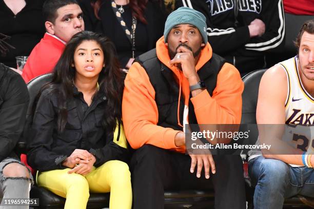 Kobe Bryant and daughter Gianna Bryant attend a basketball game between the Los Angeles Lakers and the Dallas Mavericks at Staples Center on December...