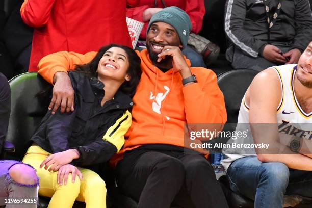 Kobe Bryant and daughter Gianna Bryant attend a basketball game between the Los Angeles Lakers and the Dallas Mavericks at Staples Center on December...