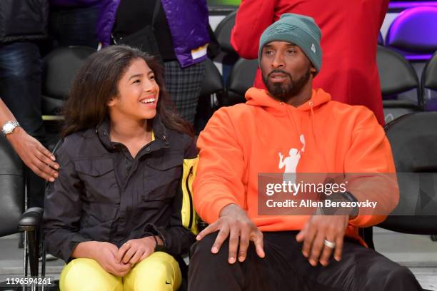 Kobe Bryant and daughter Gianna Bryant attend a basketball game between the Los Angeles Lakers and the Dallas Mavericks at Staples Center on December...