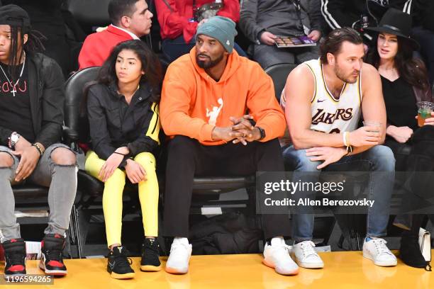 Kobe Bryant and daughter Gianna Bryant attend a basketball game between the Los Angeles Lakers and the Dallas Mavericks at Staples Center on December...