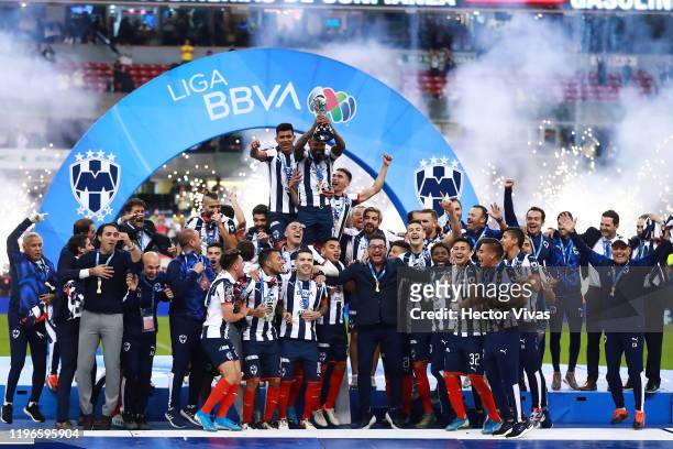 Players of Monterrey celebrate with the champions trophy after winningthe Final second leg match between America and Monterrey as part of the Torneo...