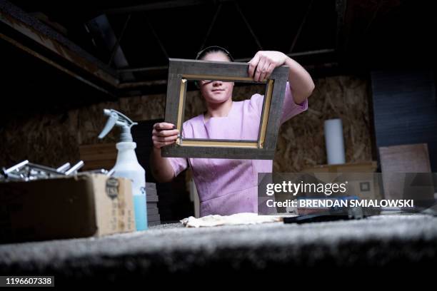 Worker assembles cabinet doors at Riverside RV, builders of recreational vehicles, on January 24, 2020 in LaGrange, Indiana. - The six or seven...