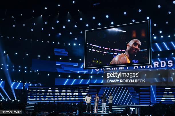 Host US singer-songwriter Alicia Keys and Boyz II Men sing in memory of late NBA legend Kobe Bryant during the 62nd Annual Grammy Awards on January...