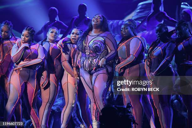 Singer-songwriter Lizzo performs onstage during the 62nd Annual Grammy Awards on January 26 in Los Angeles.
