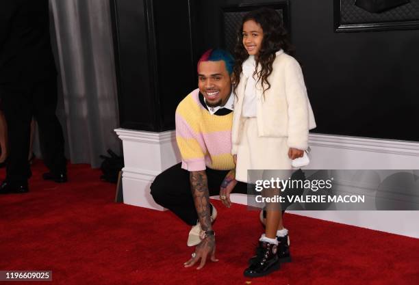 Rapper Chris Brown and his daughter Royalty arrive for the 62nd Annual Grammy Awards on January 26 in Los Angeles.
