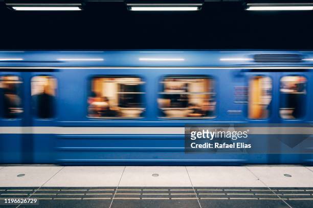 metro in motion - railroad station stock pictures, royalty-free photos & images