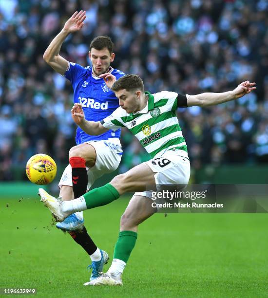 James Forrest of Celtic and Borna Barisic of Rangers battle for possession during the Ladbrokes Premiership match between Celtic and Rangers at...