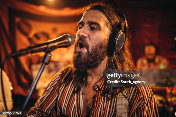 Example Man Singer Man Singer Singing On Stage High-Res Stock Photo - Getty Images