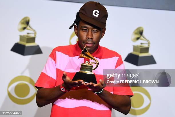 Rapper Tyler, the Creator poses in the press room with the award for Best Rap Album for "Igor" during the 62nd Annual Grammy Awards on January 26 in...