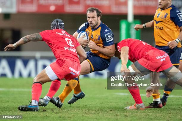 December 14: Bismarck Du Plessis of Montpellier runs at Pita Akhi of Stade Toulouse during the Montpellier V Stade Toulouse European Rugby...