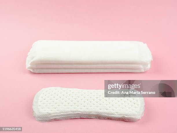 organic cotton hygienic wipes. concept of ecology and feminine hygiene. - damenbinde stock-fotos und bilder