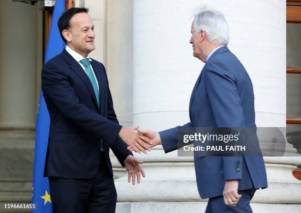 Ireland's Prime Minister Leo Varadkar greets the EU's chief Brexit negotiator Michel Barnier, ahead of their meeing at Government Buildings in Dublin...