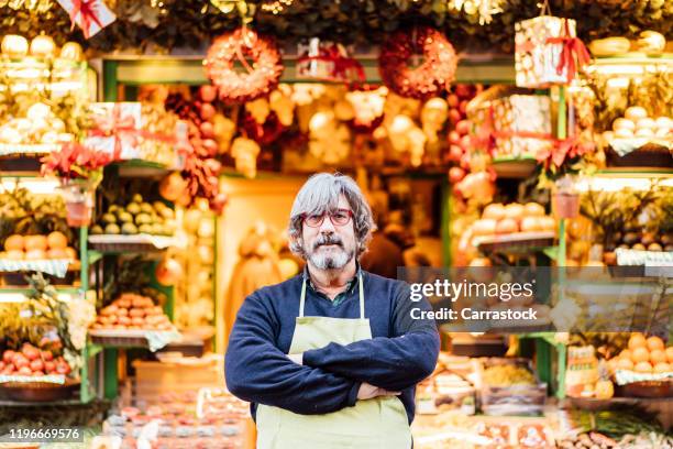 fruit shopping man posing in store - madrid food stock pictures, royalty-free photos & images