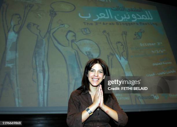 Tunisia's famous blogger Lina Ben Mhenni, who has been tipped for the 2011 Nobel Peace Prize nominations, gestures during the third Arab Bloggers...