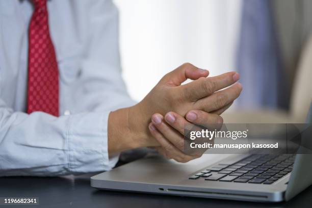 Computer Mouse Wrist Injury Photos and Premium High Res Pictures ...