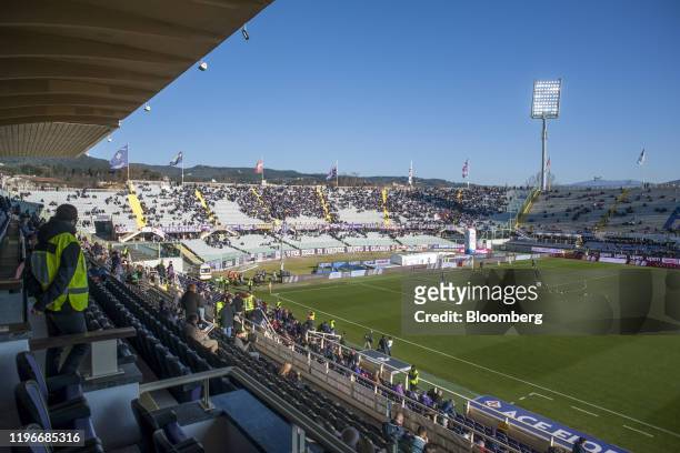 Players warm-up on the pitch ahead of the ACF Fiorentina v SPAL Italian Serie A soccer match at the Artemio Franchi stadium in Florence, Italy, on...