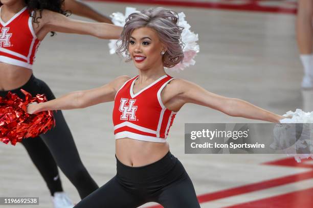 The Cougar dance team revs up the crowd during the basketball game between the University of South Florida Bulls and Houston Cougars at the Fertitta...