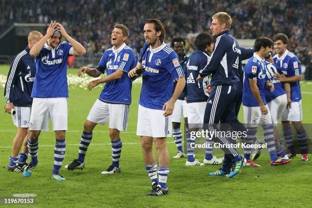 Schalke celebrates winning the Supercup match between FC Schalke 04 and Borussia Dortmund at Veltins Arena on July 23, 2011 in Gelsenkirchen,...