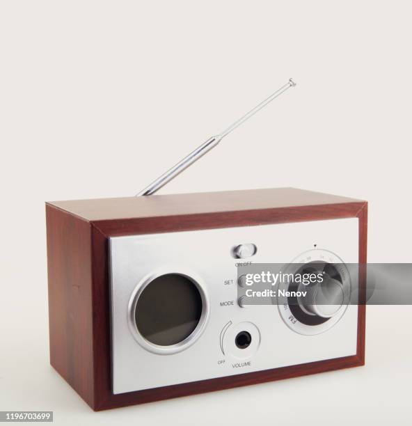 close-up of old retro radio against white background - portable radio stock pictures, royalty-free photos & images