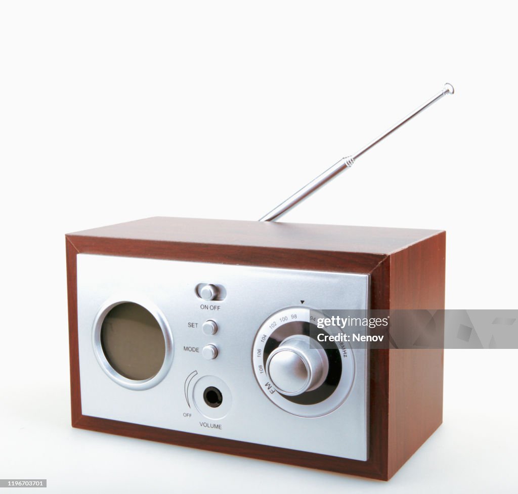 Close-Up Of Old Retro Radio Against White Background