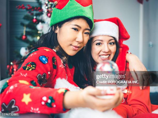 millennial christmas party - funny snow globe stock pictures, royalty-free photos & images