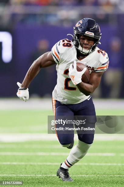 Tarik Cohen of the Chicago Bears carries the ball against the Minnesota Vikings during the game at U.S. Bank Stadium on December 29, 2019 in...