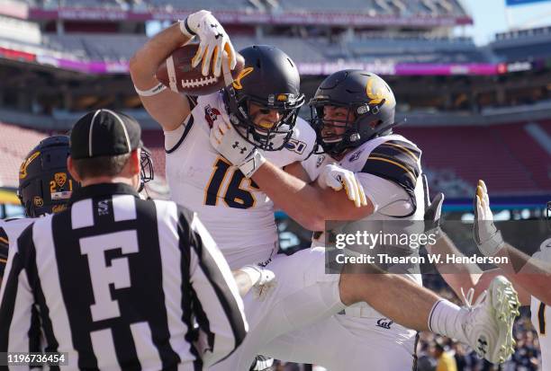 Collin Moore of the California Golden Bears celebrates after he caught a touchdown pass against the Illinois Fighting Illini during the first half of...