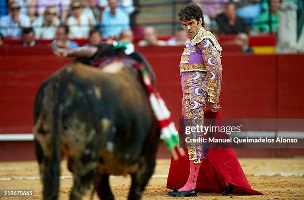 Spanish bullfighter Jose Tomas performs during a bullfight at the Plaza Valencia bullring on July 23, 2011 in Valencia, Spain.