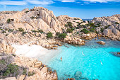 Bathing at a secluded Beach, Sardinia, Italy