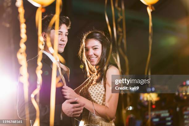 teenage couple having fun at prom - prom imagens e fotografias de stock
