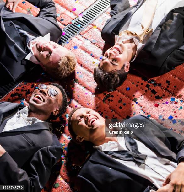 four teenage boys in formalwear, after prom - prom stock pictures, royalty-free photos & images