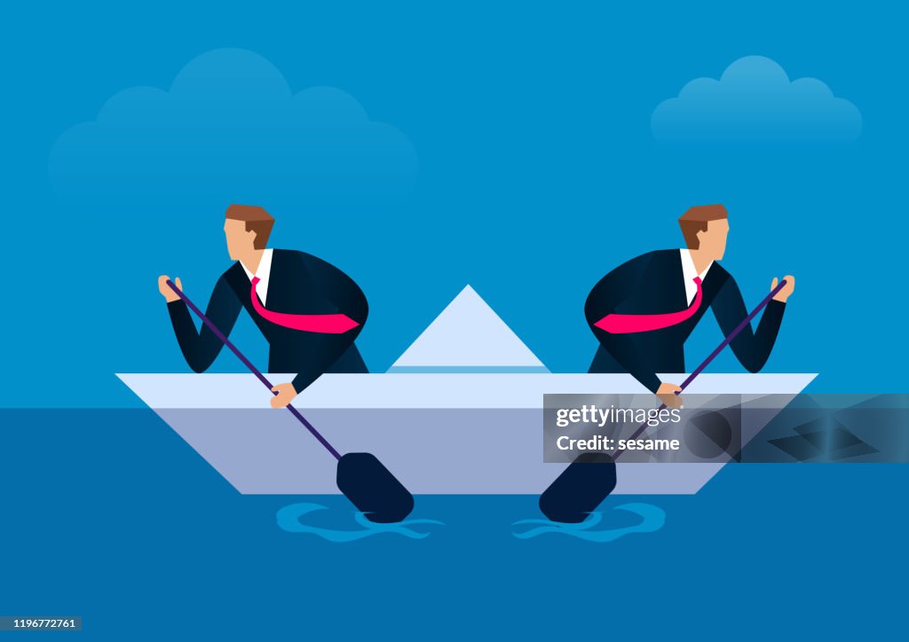 Disunited, two businessmen paddling in opposite directions