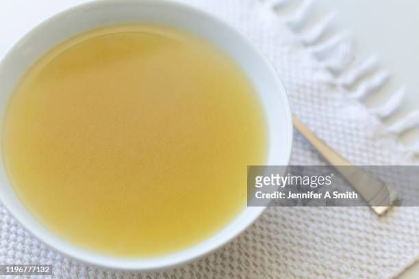 chicken soup - broth stock pictures, royalty-free photos & images