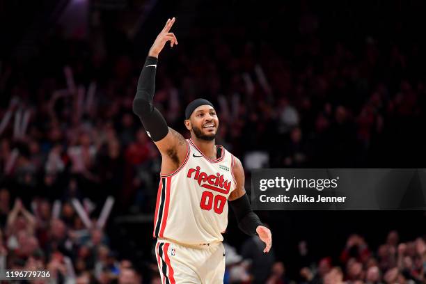 Carmelo Anthony of the Portland Trail Blazers reacts to a play during the second half of the game against the Phoenix Suns at the Moda Center on...