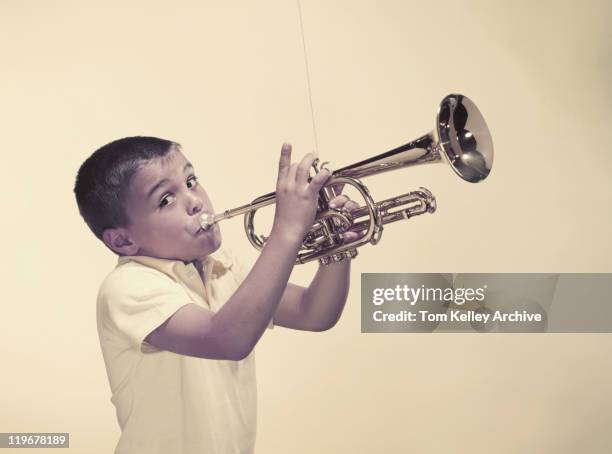 boy playing trumpet, portrait - 1957 stock pictures, royalty-free photos & images