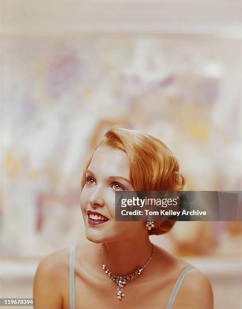 young woman smiling, close-up - archival woman stock pictures, royalty-free photos & images