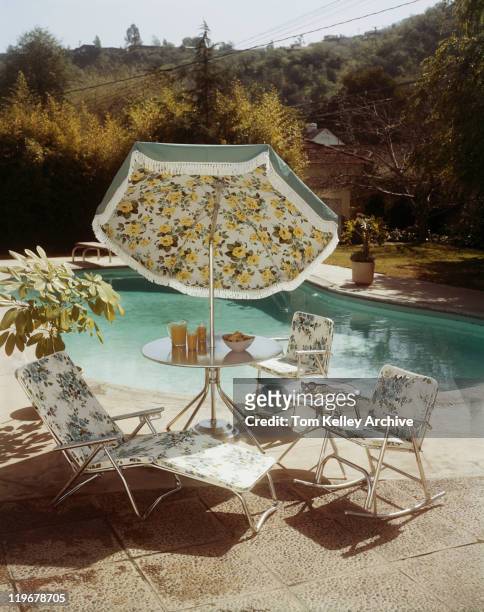food on table with sun lounger, chair, and umbrella near poolside - 1966 bildbanksfoton och bilder