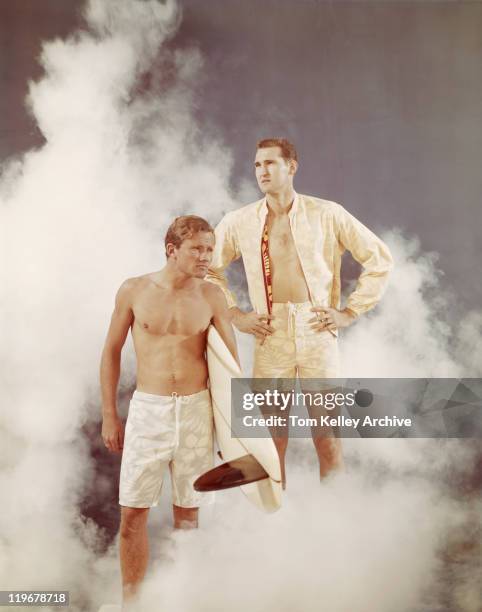 surfers standing in smoke, looking away - 1966 bildbanksfoton och bilder