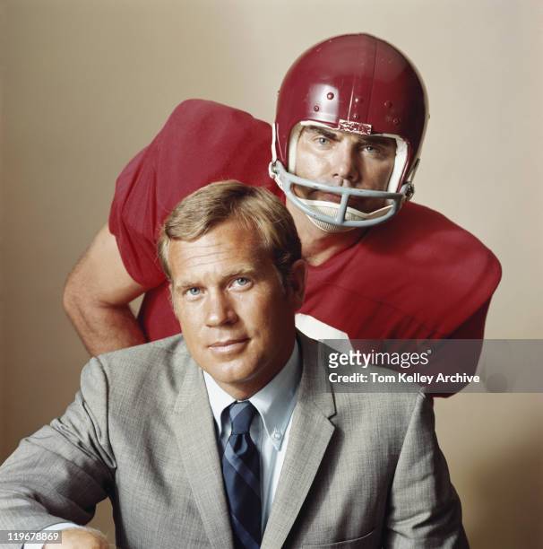 coach with american football player, portrait - archival stock pictures, royalty-free photos & images