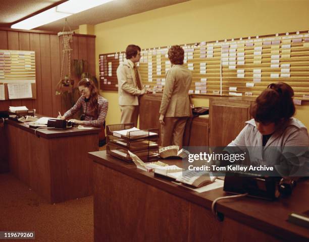 people working in office - 70's stockfoto's en -beelden