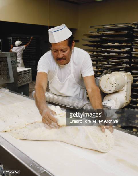 man holding dough in bakery - 1983 stock pictures, royalty-free photos & images