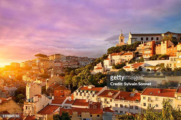 lisbon, old town at sunset - portugal photos et images de collection