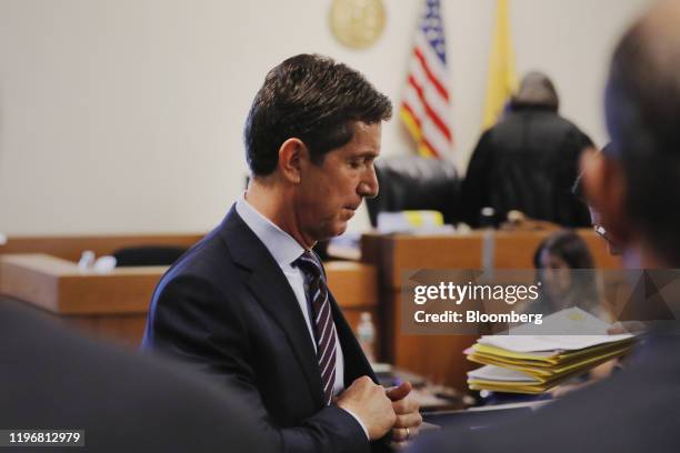 Alex Gorsky, chief executive officer of Johnson & Johnson, exits after testifying at Middlesex County Superior Court in New Brunswick, New Jersey,...