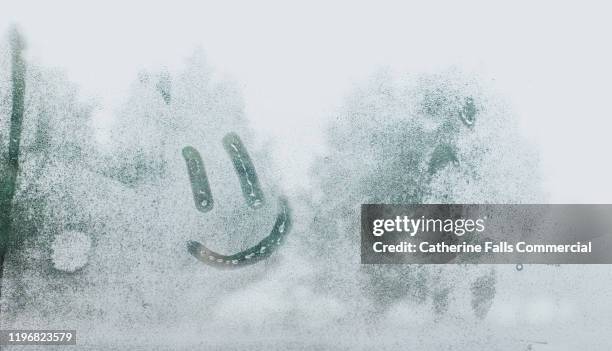 face drawn in condensation - nice weather stock pictures, royalty-free photos & images