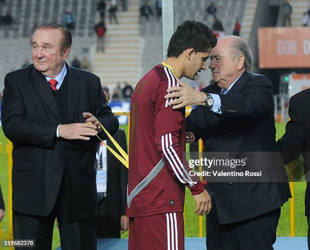 Players from Venezuela, receives a medal after the match between Venezuela and Peru as part of the Copa America 2011 at Ciudad de La Plata Stadium on...