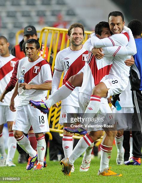 Peru's players celebrate after scoring against Venezuela during 2011 Copa America soccer third place match at the Ciudad de La Plata stadium on July...